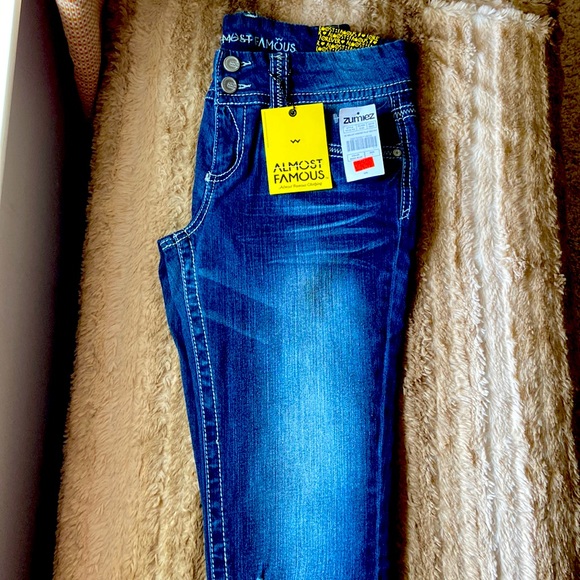 Almost Famous Denim - BNW ALMOST FAMOUS BRAND distressed jeans size junior 7 with tags